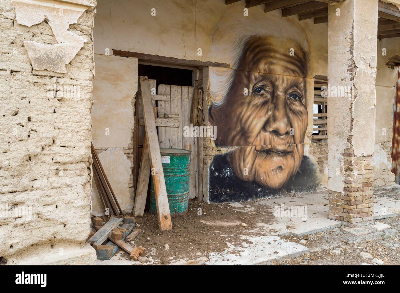 Graffiti by the French artist Zabou in an abandoned village near Athienou.woman Stock Photo