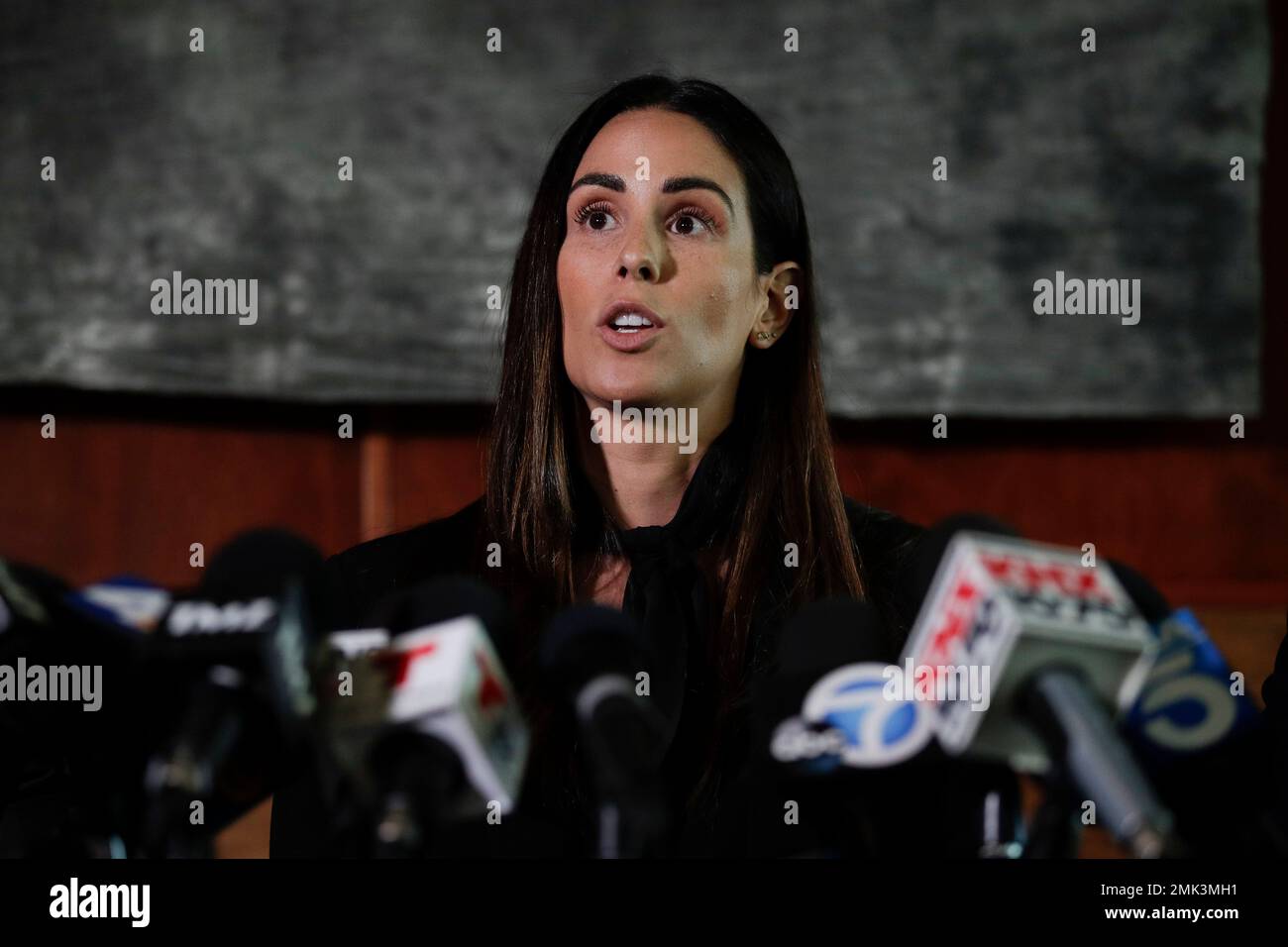 Former sports reporter Kelli Tennant speaks during a news conference  Tuesday, April 23, 2019, in Los Angeles. Tennant filed the suit in Los  Angeles County Superior Court on Monday, contending new Sacramento