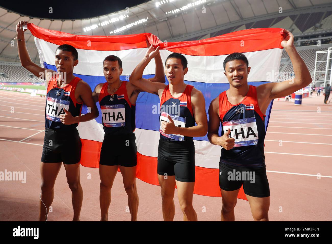 Thai athletes celebrate after competing in the men