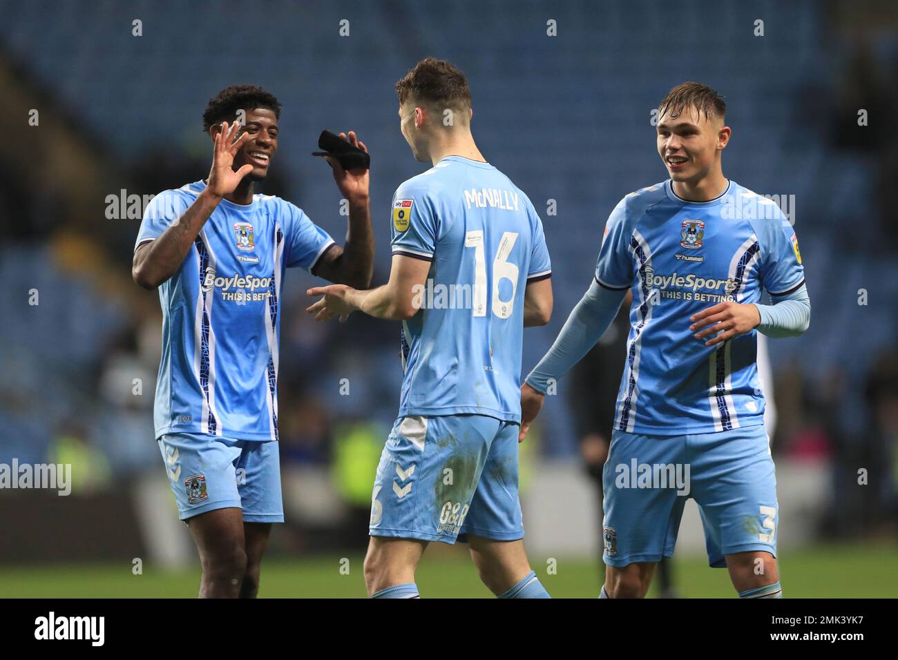 (left to right) Coventry City's Jonathan Panzo, Luke McNally and Callum Doyle celebrate after the final whistle of the Sky Bet Championship match at the Coventry Building Society Arena, Coventry. Picture date: Saturday January 28, 2023. Stock Photo