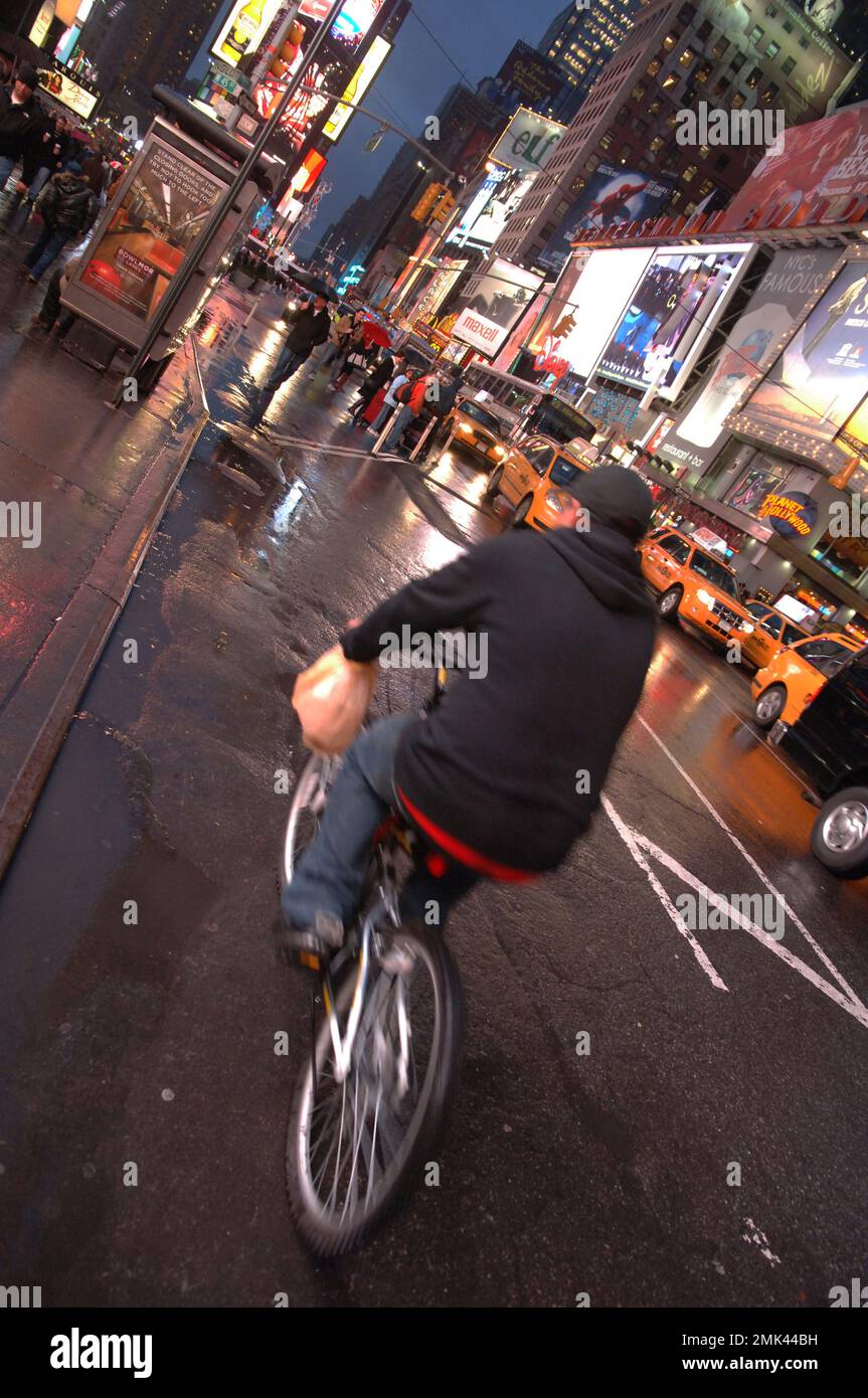 Late Night Cyclist, New York City, USA. Stock Photo