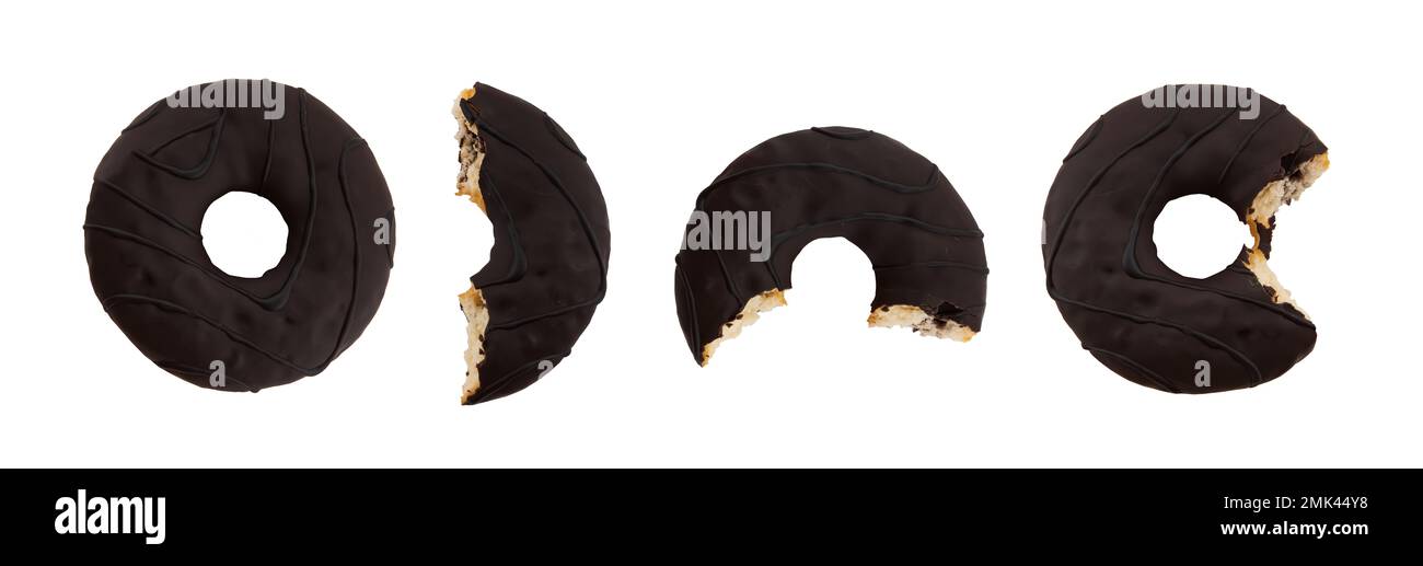 Set of chocolate donuts. Four stages of biting a donuts on a white