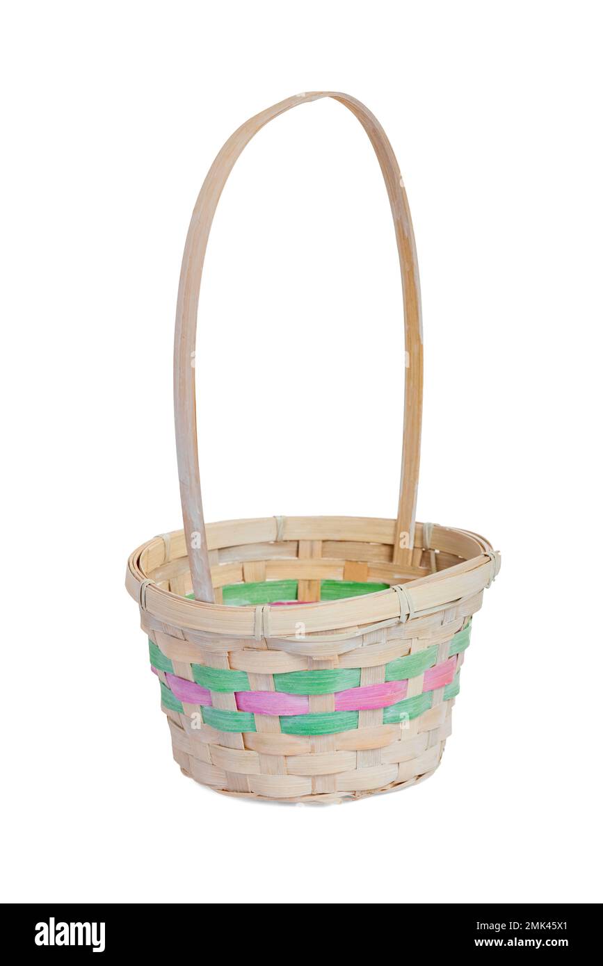An empty wicker basket isolated on white background. Easter item Stock Photo