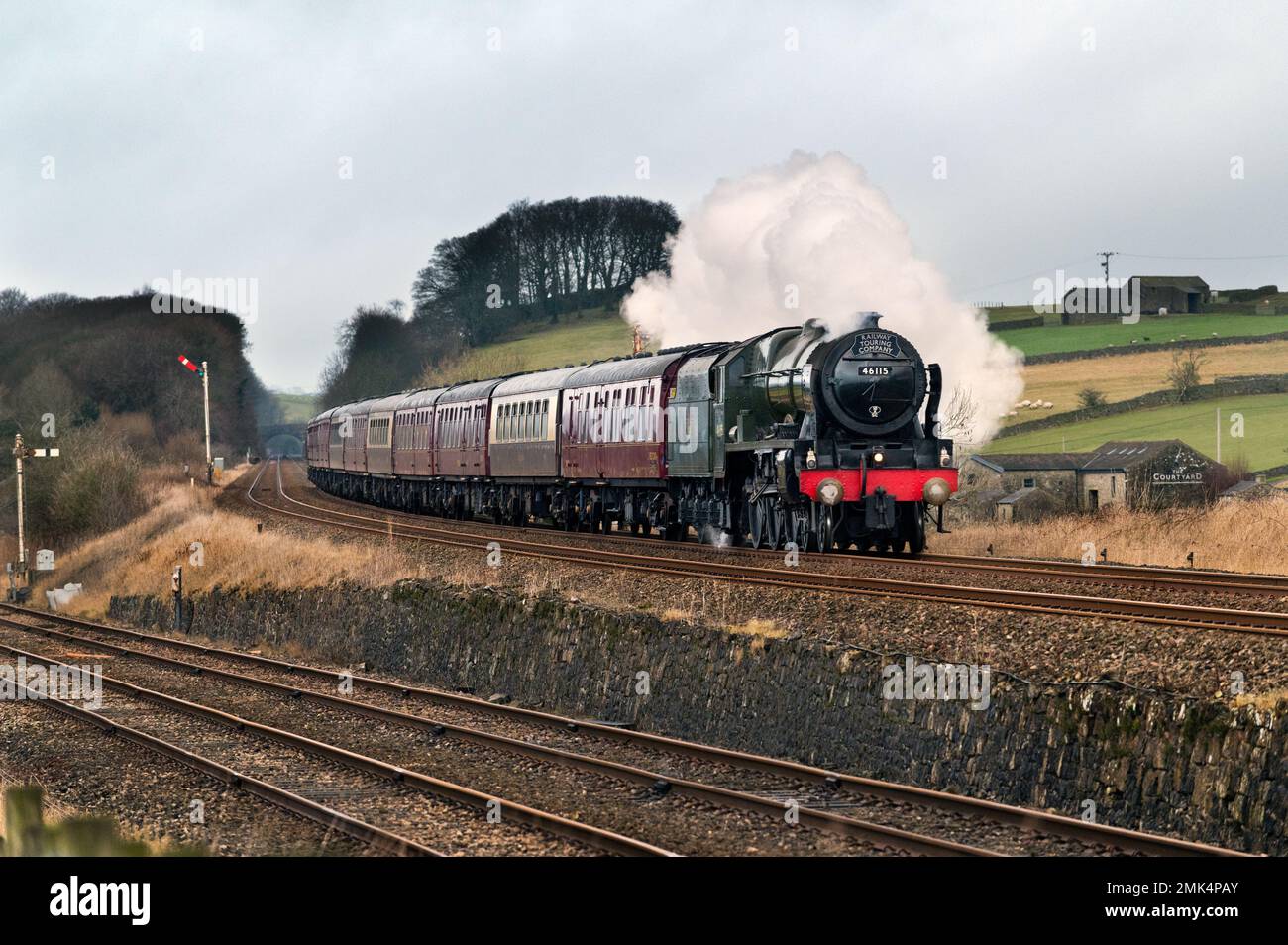 Steam special on the famous Settle-Carlisle railway line. 'The Winter Cumbrian Mountain Express' hauled by steam locomotive 'Scots Guardsman', 46115.  The train is seen here at Settle Junction at the southern end of the Settle-Carlisle railway line. Credit: John Bentley/Alamy Live News Stock Photo