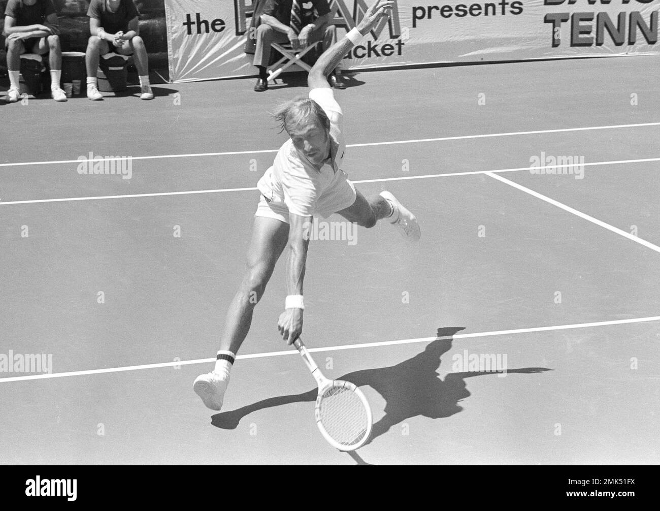 Stan Smith of the U.S. makes a stretching return during the match with  Romania's toma Ovici in the opening singles match of the Davis Cup  Interzone Finals in Alamo, Calif., Aug. 18,