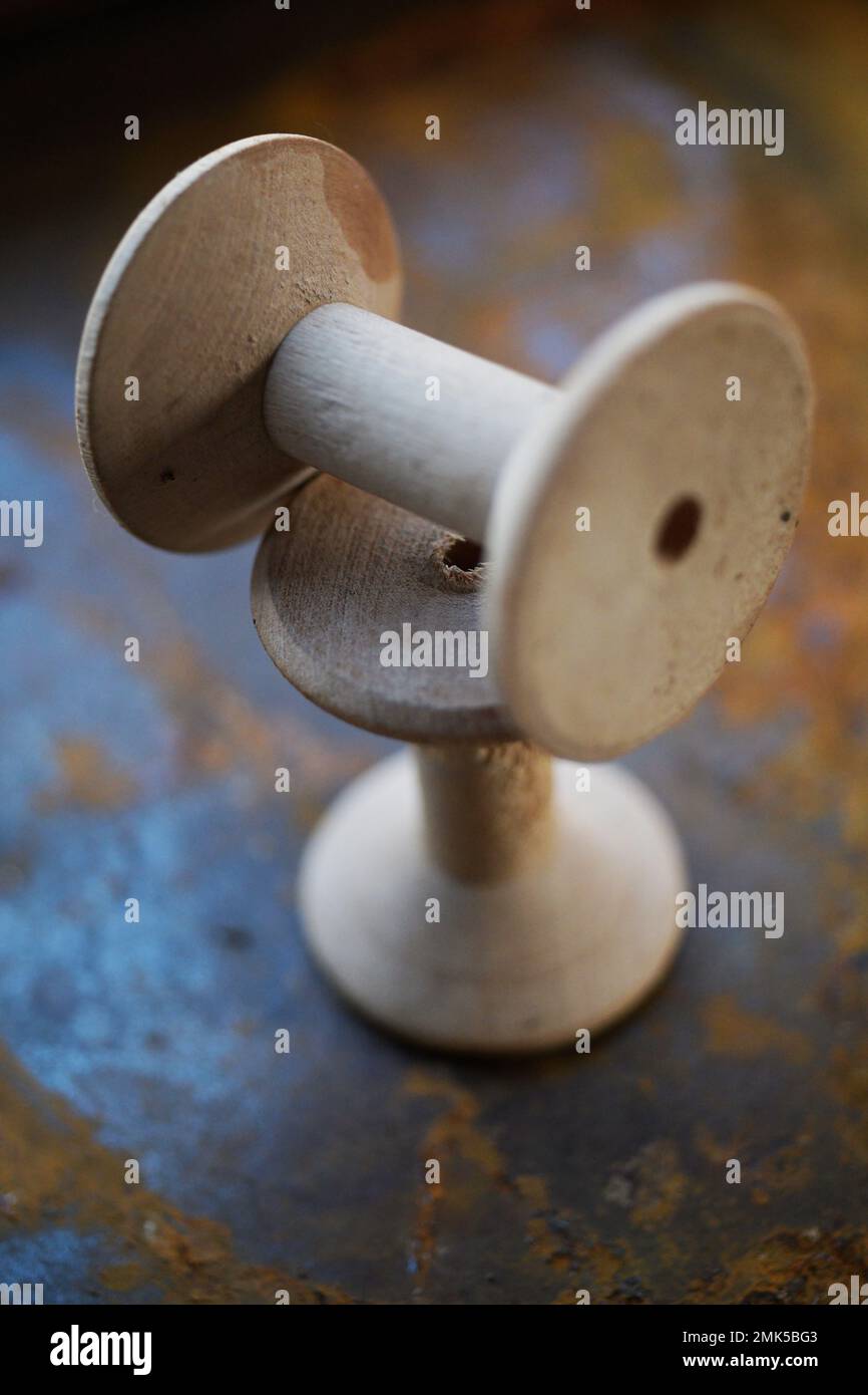 two old fashioned empty wooden cotton reels Stock Photo Alamy