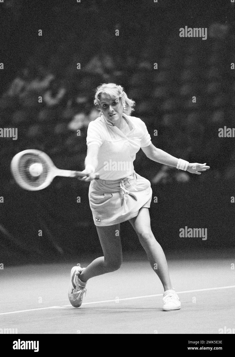 Tracy Austin catches the ball on her racket for a return against Kelly