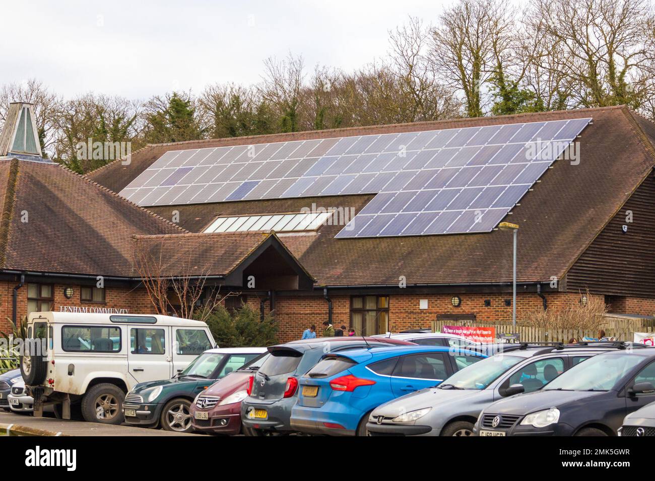 Solar panels on the roof of Lenham community centre, kent, uk Stock Photo