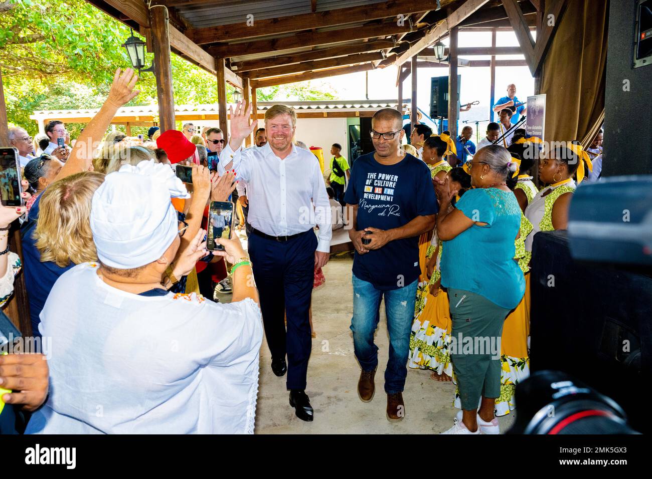 King Willem-Alexander of the Netherlands during a visit to Witte Pan Old  Slave Huts, Nos Zjilea event at Cultural Park Mangazina di Rei, windsurfing  act at Sorobon, STINAPA National Park and mangroves