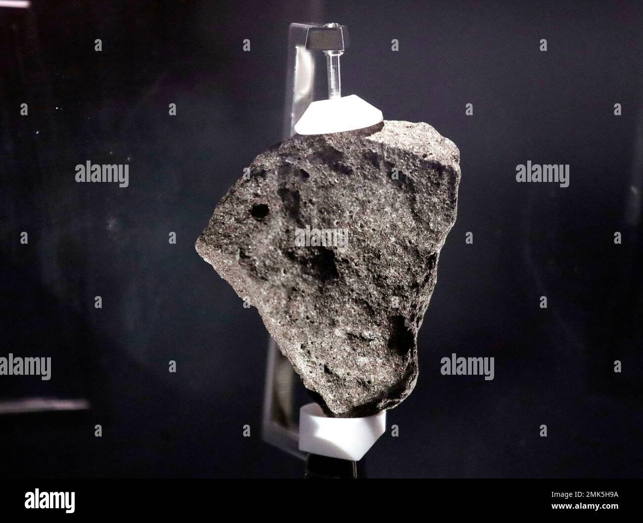 A lunar sample moon rock is displayed at Destination Moon: The Apollo ...