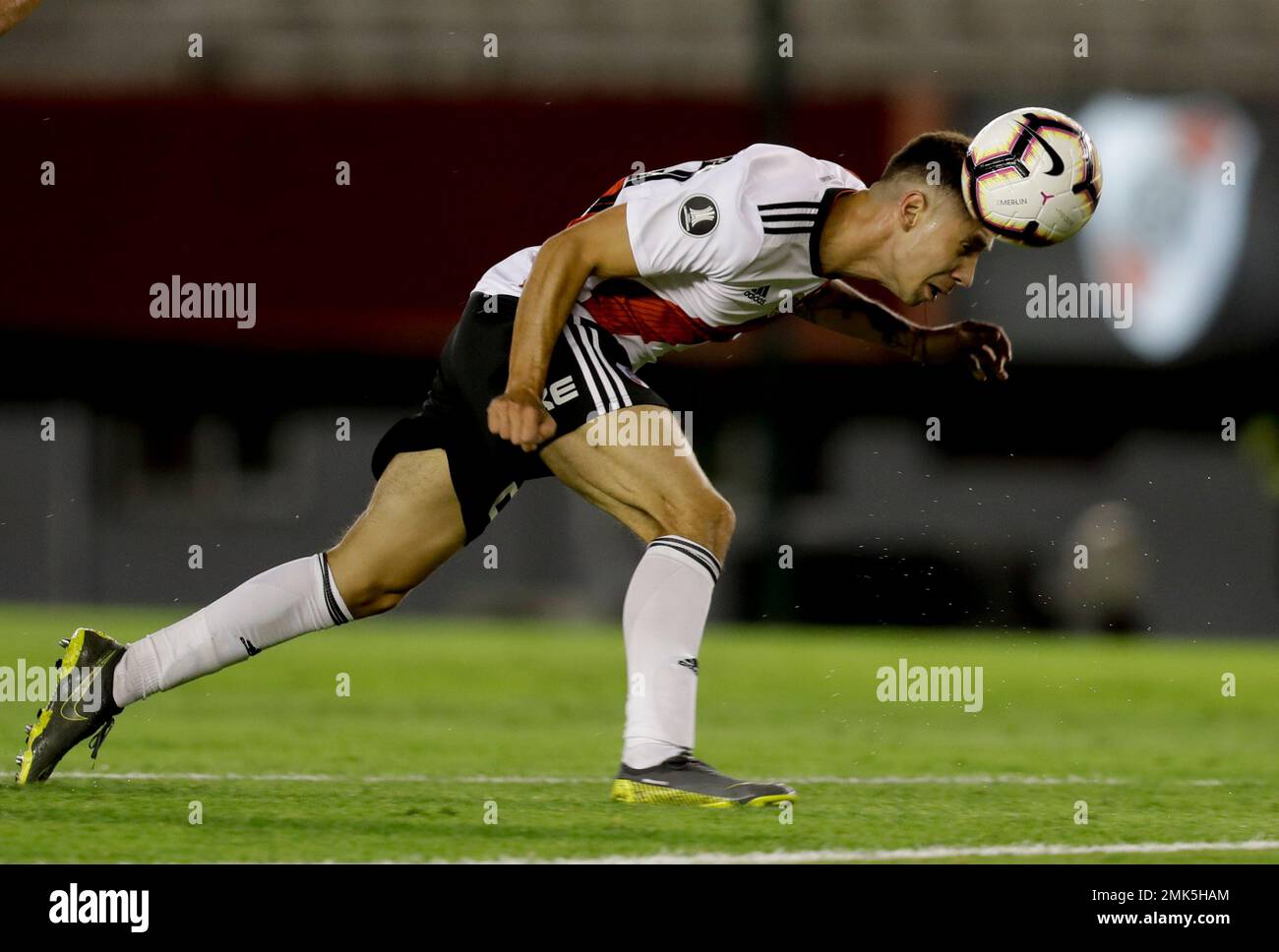 Gonzalo Montiel of Argentina's River Plate heads the ball during a
