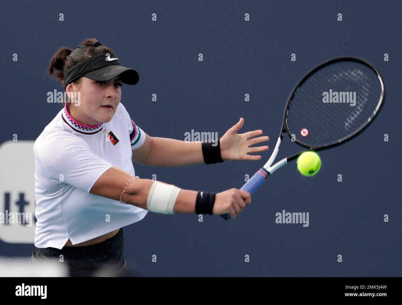 Bianca Andreescu, of Canada, returns to Irina Camelia Begu, of Romania,  during the Miami Open tennis tournament, Thursday, March 21, 2019, in Miami  Gardens, Fla. (AP Photo/Lynne Sladky Stock Photo - Alamy