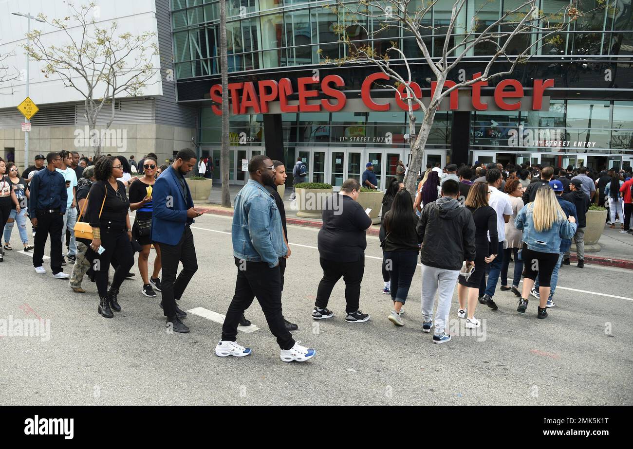 Guests file into the Staples Center to attend the Celebration of Life