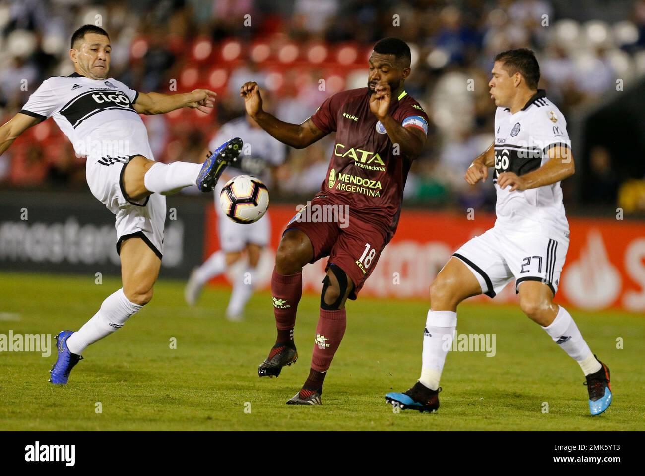 Santiago Damian Garcia Correa of Argentina's Godoy Cruz heads to score  against Paraguay's Olimpia during a Copa Libertadores soccer game in  Asuncion, Paraguay, Tuesday, April 9, 2019. (AP Photo/Jorge Saenz Stock  Photo 