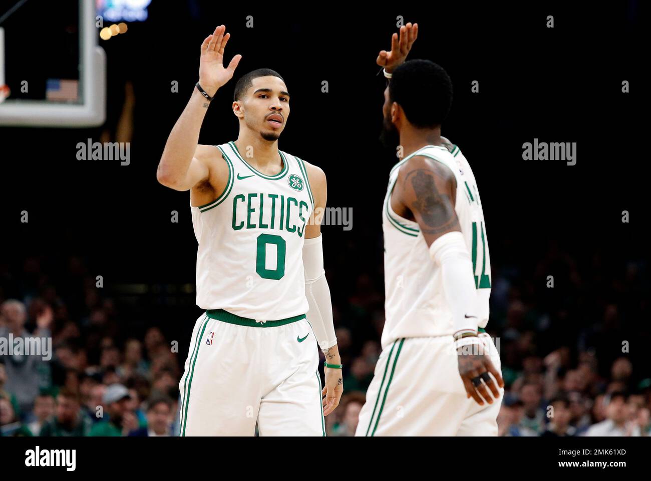 Boston Celtics' Jayson Tatum (0) high-fives Derrick White (9) after scoring  and drawing a foul during first half of an NBA basketball game against the  Los Angeles Lakers Tuesday, Dec. 13, 2022