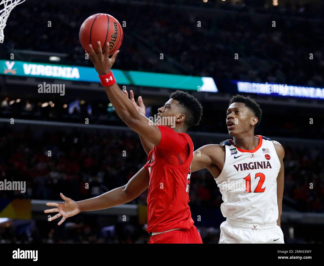 Texas Tech's Jarrett Culver (23) takes a shot against Virginia's De