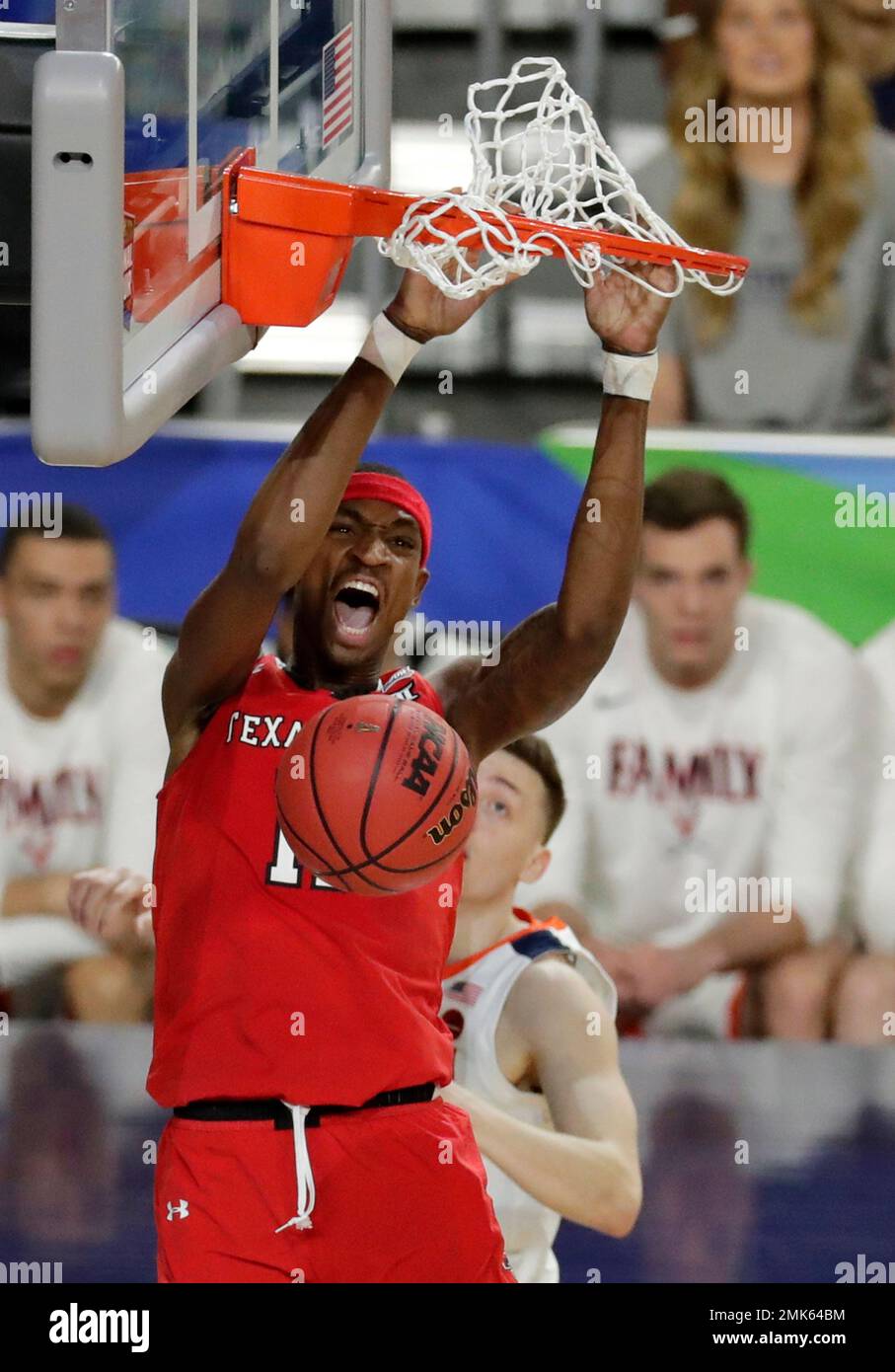 Texas Tech forward Tariq Owens dunks the ball during the first half