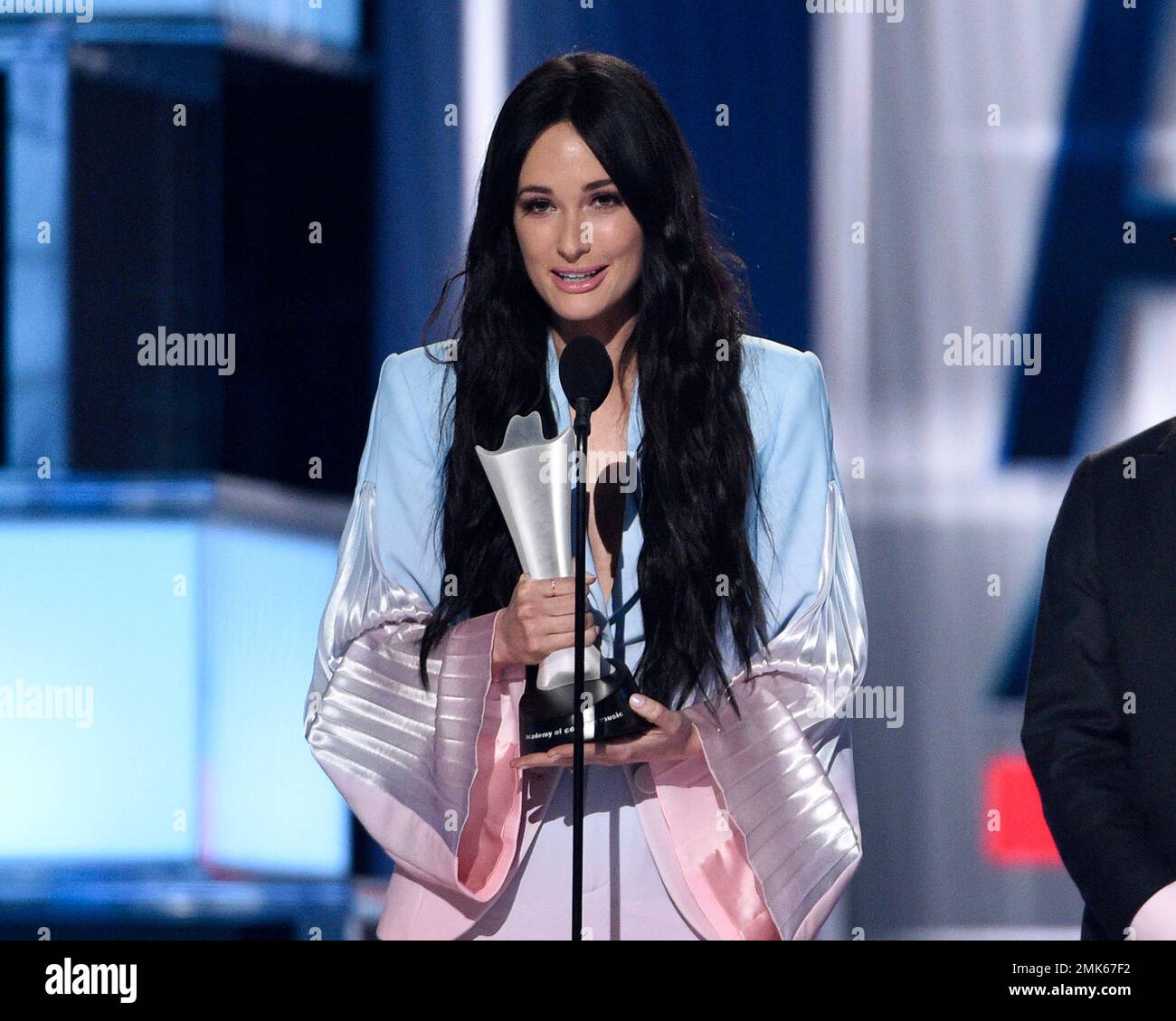 Kacey Musgraves accepts the award for album of the year for "Golden(01)