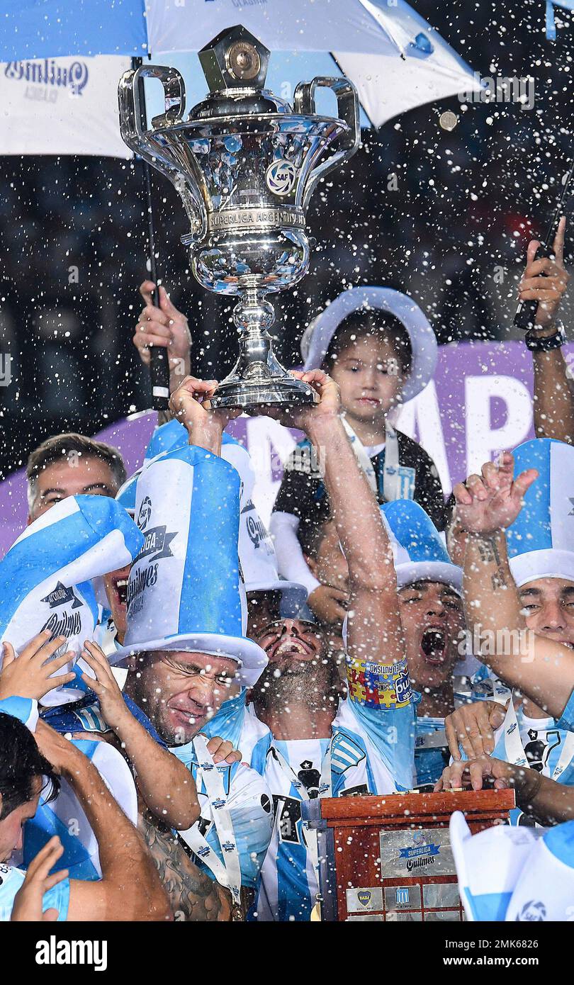 Racing Club players celebrate with their national league trophy after  defeating Defensa y Justicia in Buenos Aires, Argentina, Sunday, April 7,  2019. Racing Club, one of the five giants of Argentinian soccer