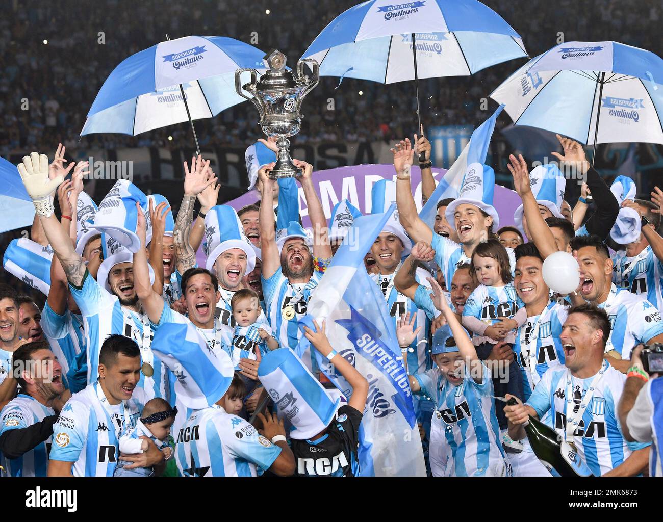 Racing Club players celebrate with their national league trophy after  defeating Defensa y Justicia in Buenos Aires, Argentina, Sunday, April 7,  2019. Racing Club, one of the five giants of Argentinian soccer