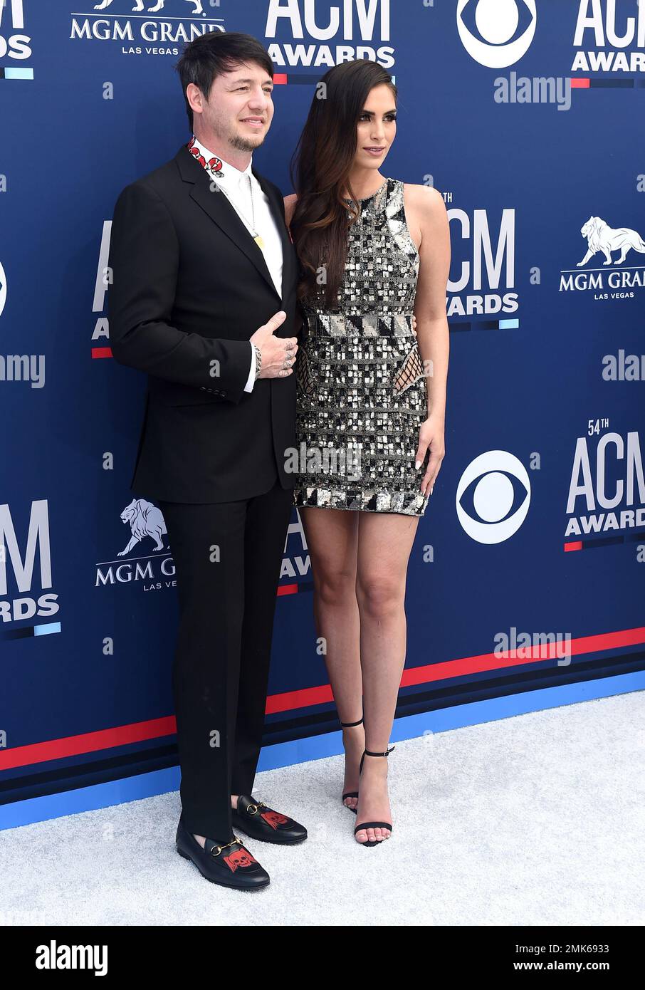 Jon Stone, left, and Brittainy Taylor arrive at the 54th annual Academy