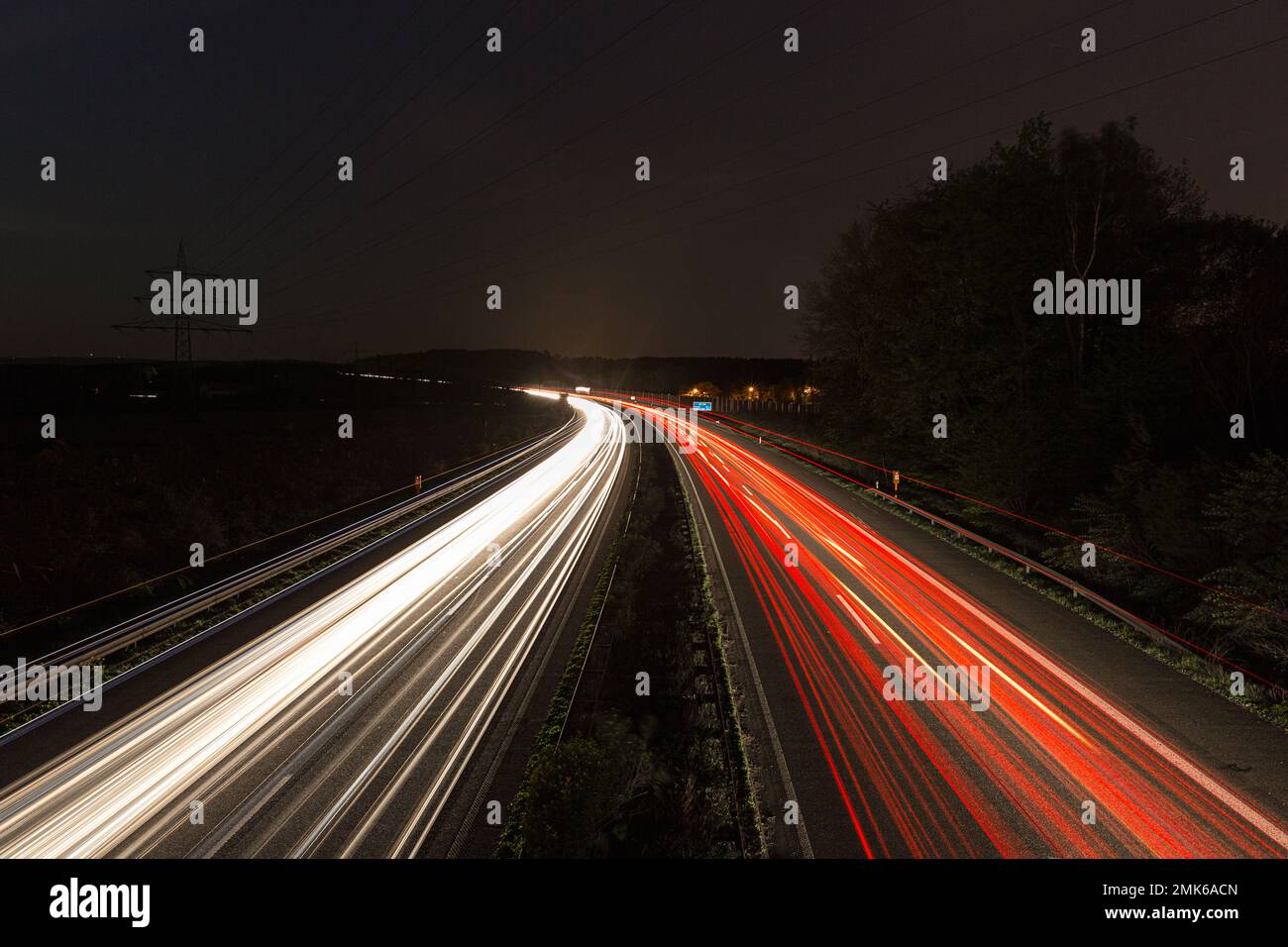 light trails at night on a highway Stock Photo - Alamy