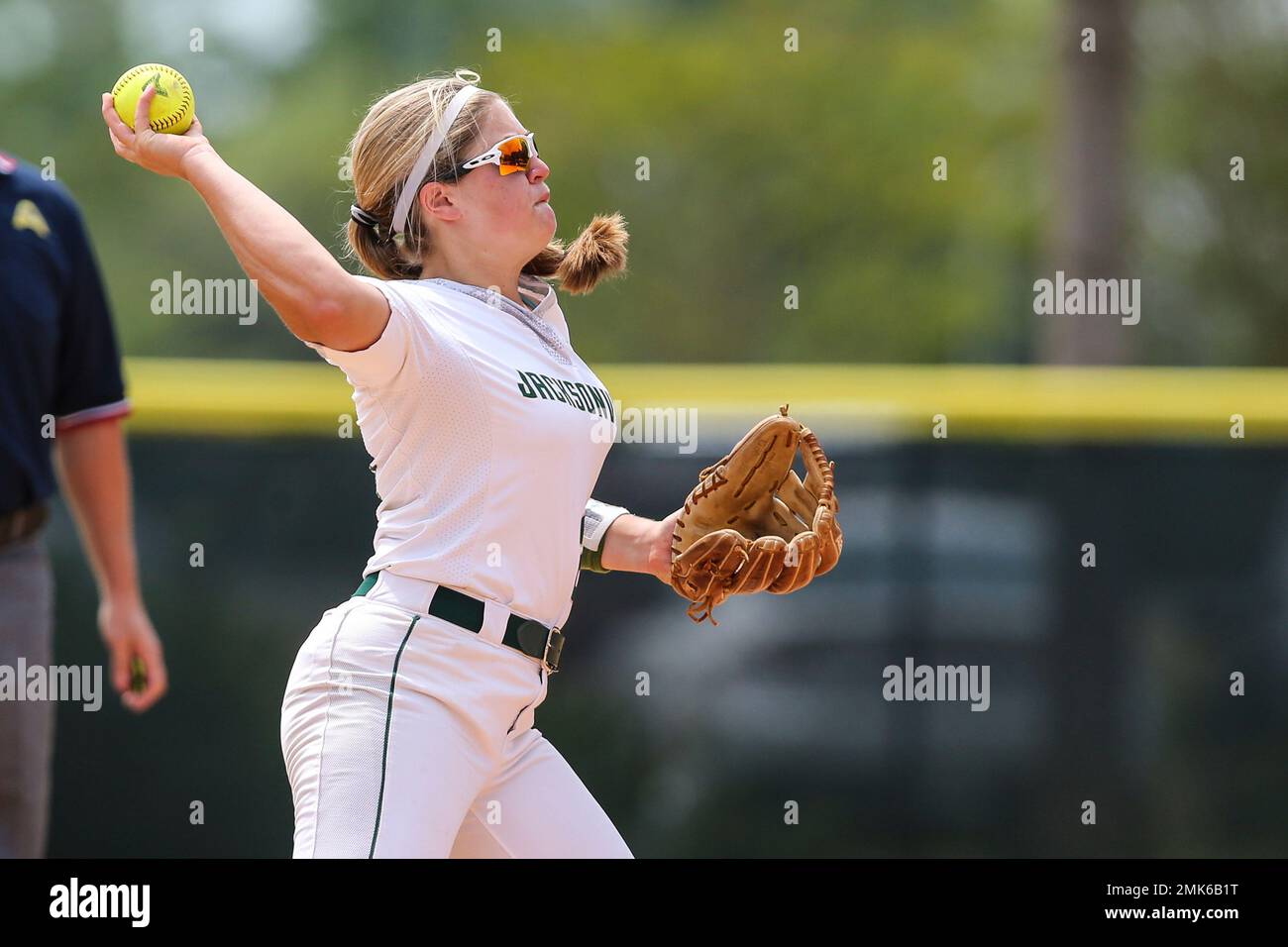 Jacksonville's Haley Holloway (20) throws from second to first to
