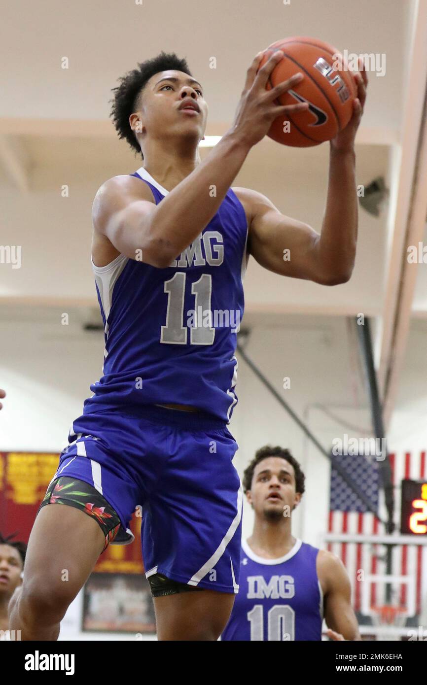 IMG Academy's Jaden Springer #11 in action against La Lumiere in