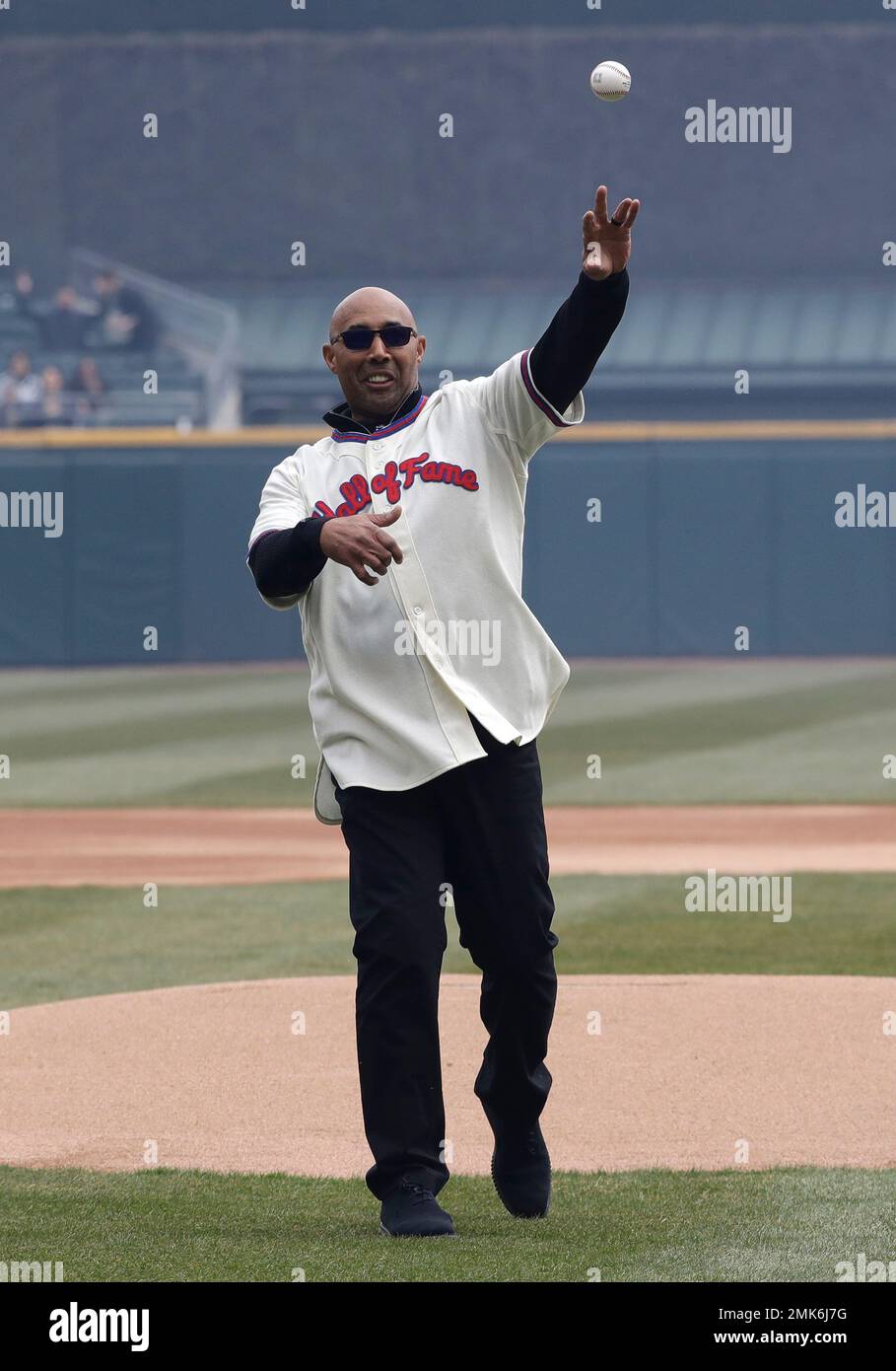 Baseball Hall of Fame inductee Harold Baines throws out a ceremonial first  pitch before a baseball game between the Seattle Mariners and the Chicago  White Sox, Friday, April 5, 2019, in Chicago. (