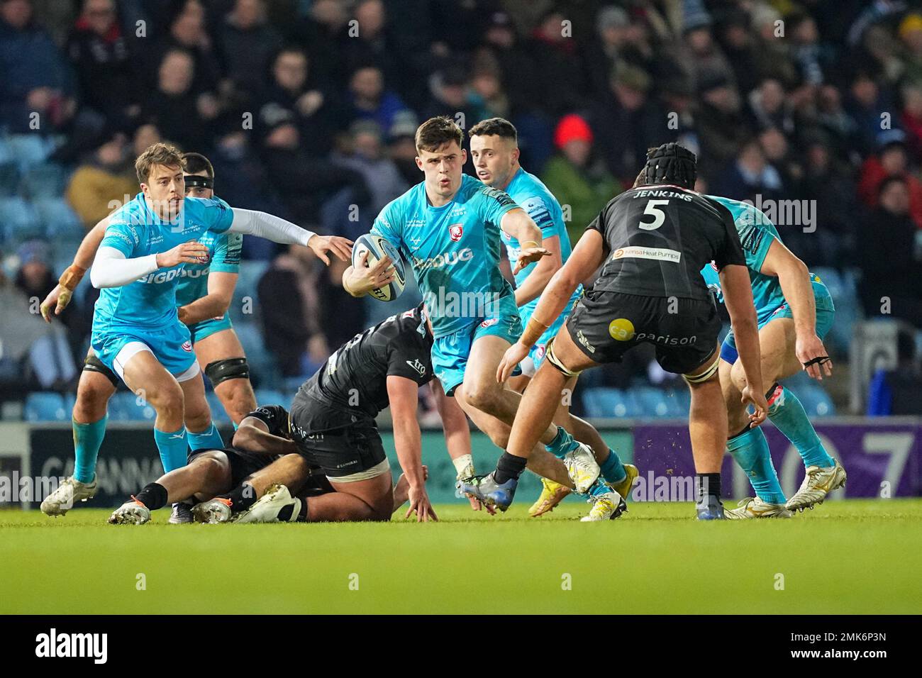 Harry Elrington of Gloucester Rugby tries to fend off Dafydd Jenkins of