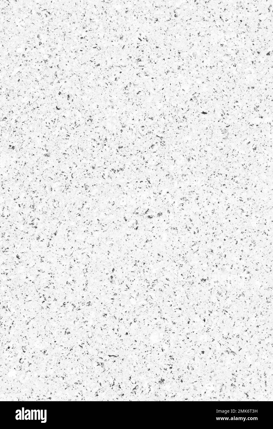 Close-up of a white wall or flooring made of concrete or cement and small stones. Abstract full frame textured background in black & white. Copy space Stock Photo