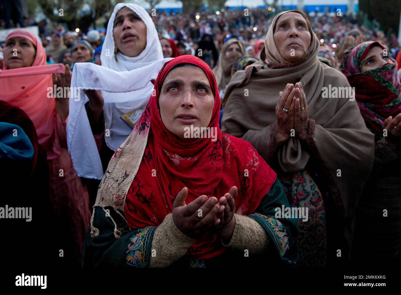Tears roll down the cheeks of a Kashmiri Muslim woman as the head ...