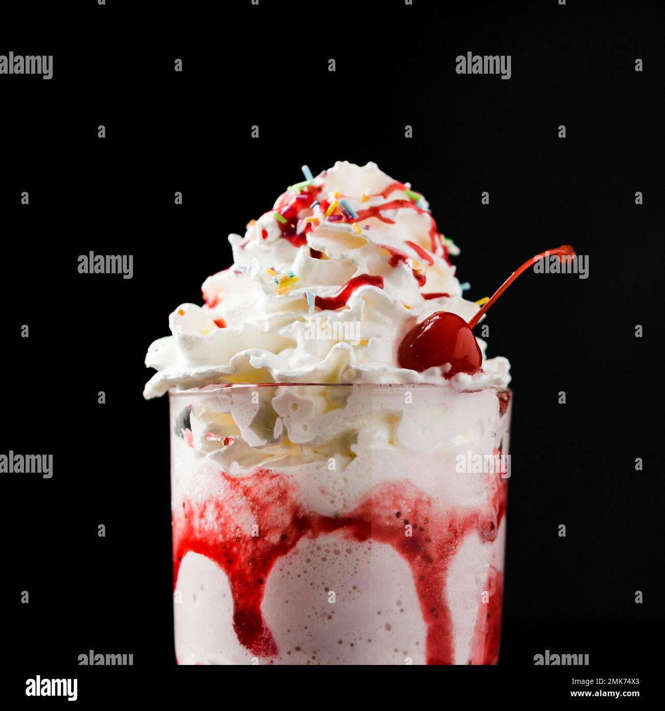delicious strawberry milkshake beverage front view. High resolution
