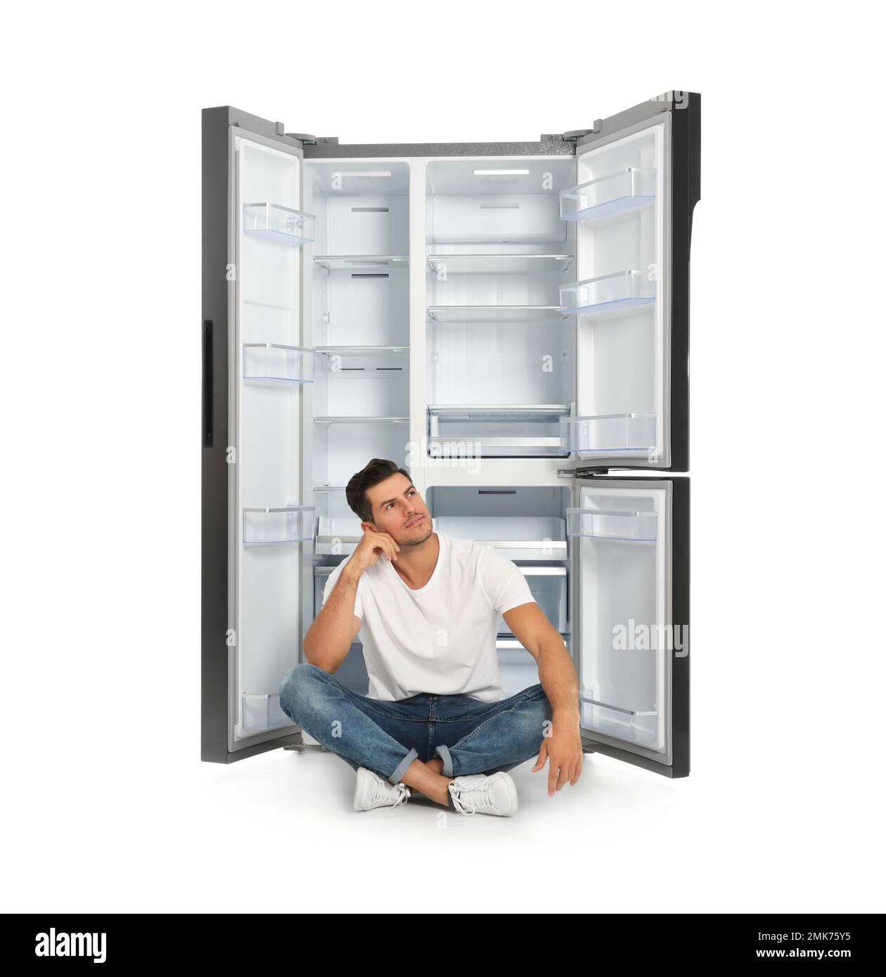 https://c8.alamy.com/comp/2MK75Y5/man-near-open-empty-refrigerator-on-white-background-2MK75Y5.jpg