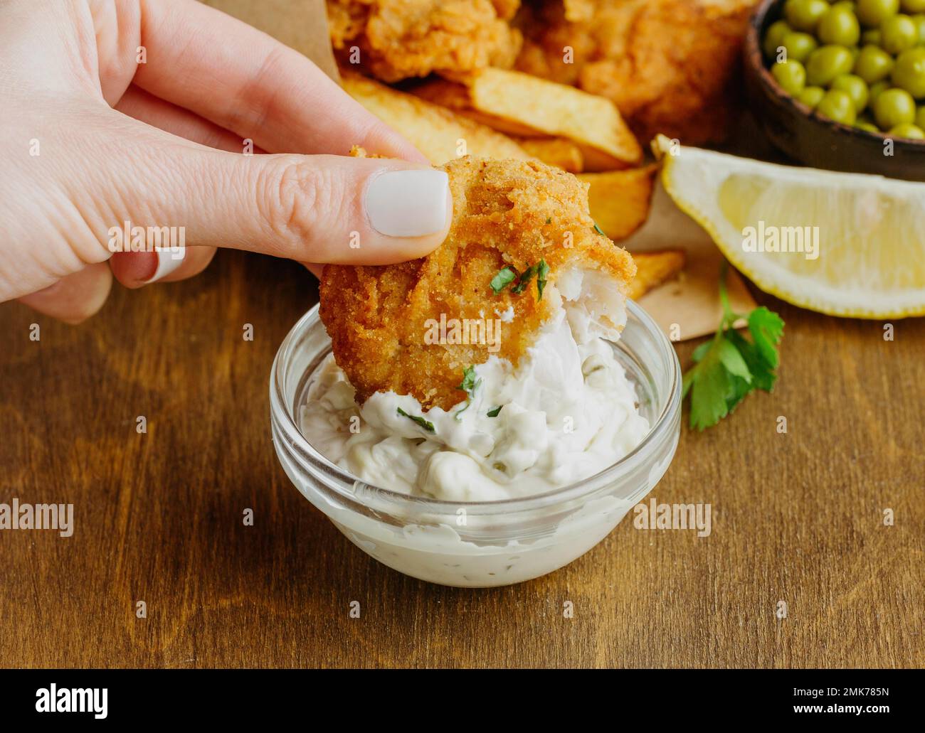 woman dipping fish sauce. High resolution photo Stock Photo Alamy