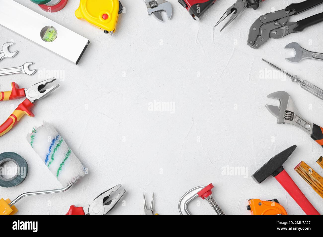 Flat lay composition with construction tools on white background. Space ...