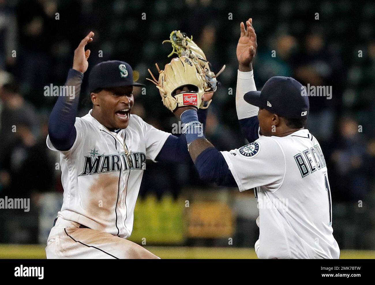 Seattle Mariners' Mallex Smith, left and Tim Beckham, right, celebrate