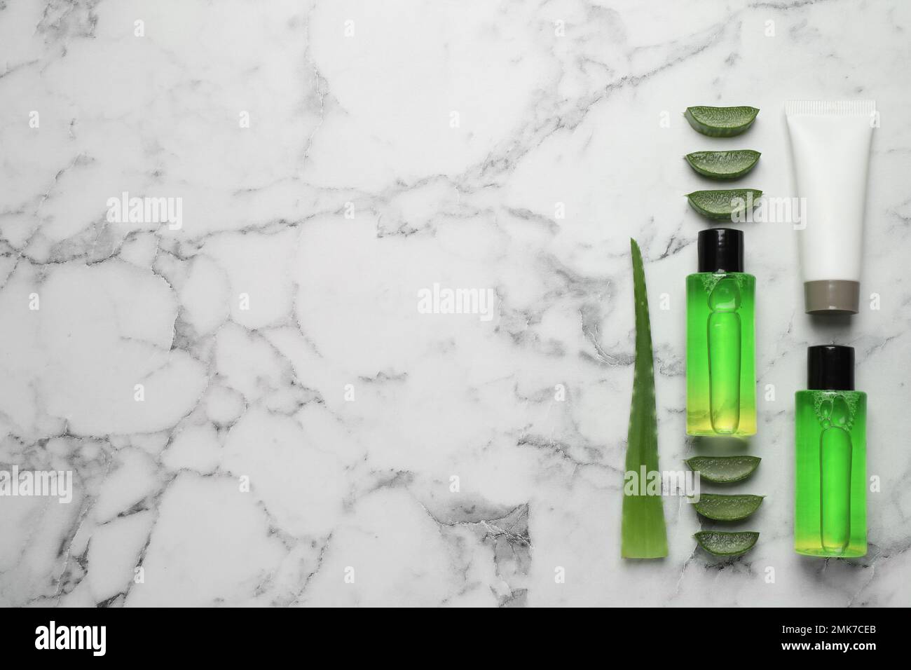 Flat lay composition with aloe vera and cosmetic products on white ...