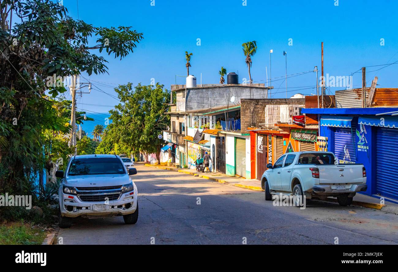 Puerto Escondido Oaxaca Mexico 2022 Busy road street driving cars