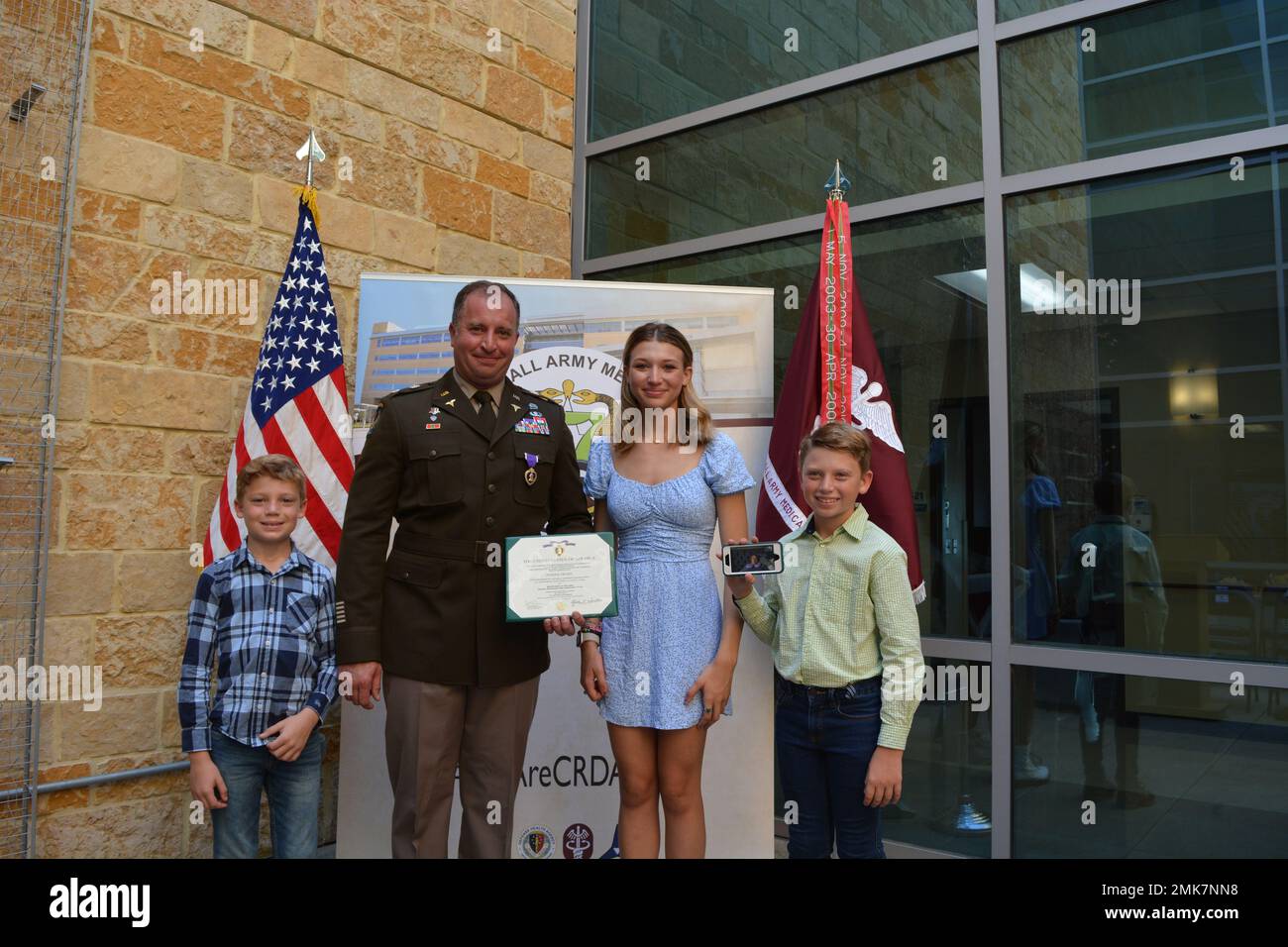 Fort Hood, Texas Brillhart poses with his family, Cooper, Olivia and