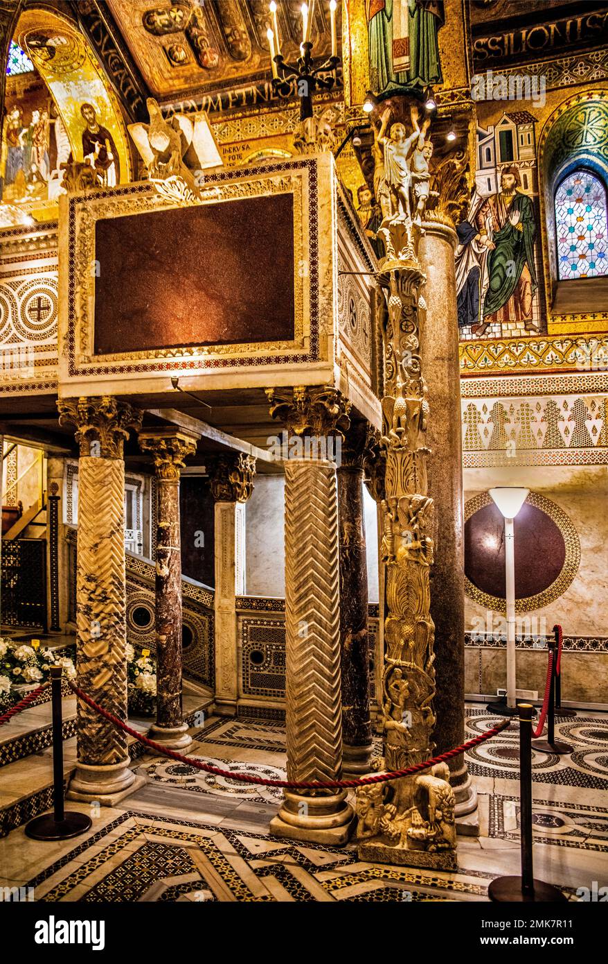 Ambo resting on four columns and Romanesque candelabra, elaborate gold ...