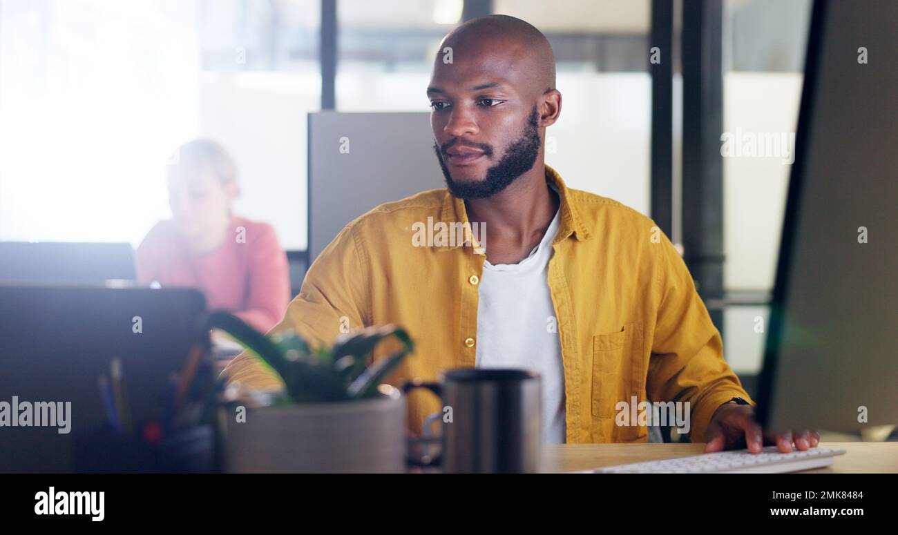 Information technology, research and businessman on computer, laptop and keyboard for software development, website and system update. Programming Stock Photo