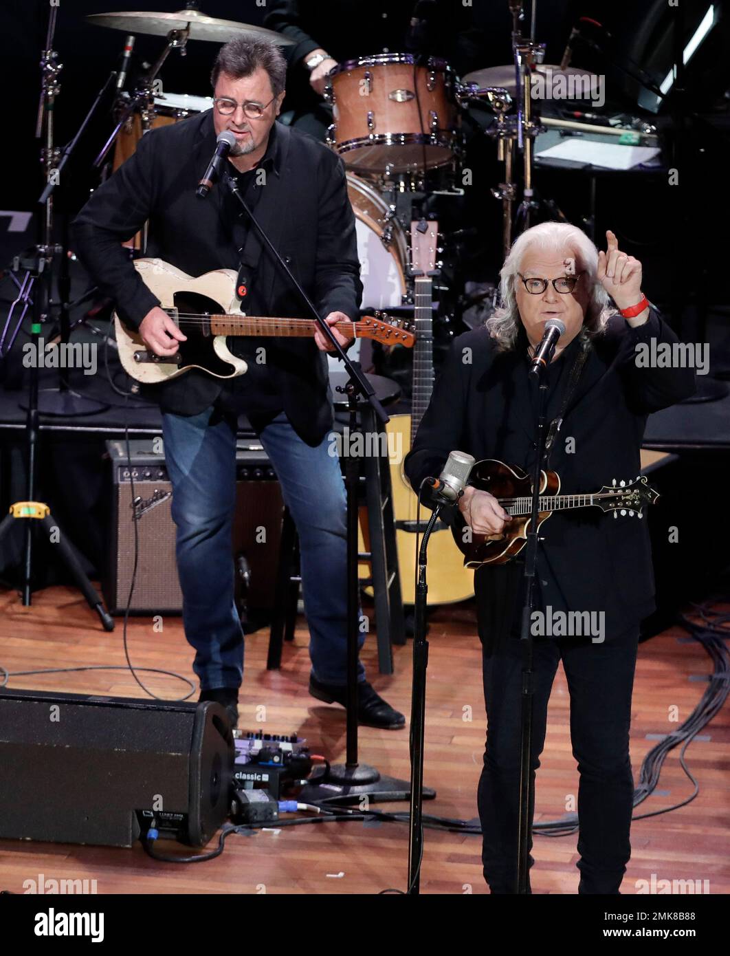 Vince Gill, left, and Ricky Skaggs perform during a television taping ...