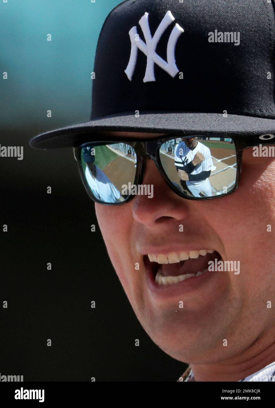 New York Yankees manager Aaron Boone is reflected in the