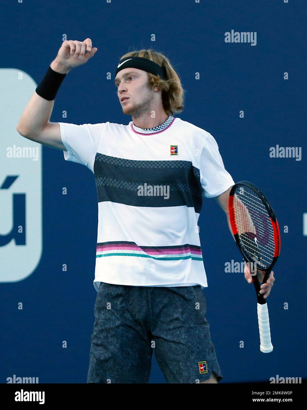 Andrey Rublev, of Russia, reacts after losing a point to Denis Shapovalov, of Canada, during the Miami Open tennis tournament Monday, March 25, 2019, in Miami Gardens, Fla