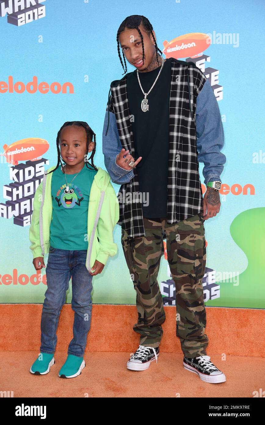 Tyga, right, and his son King Cairo arrive at the Nickelodeon Kids