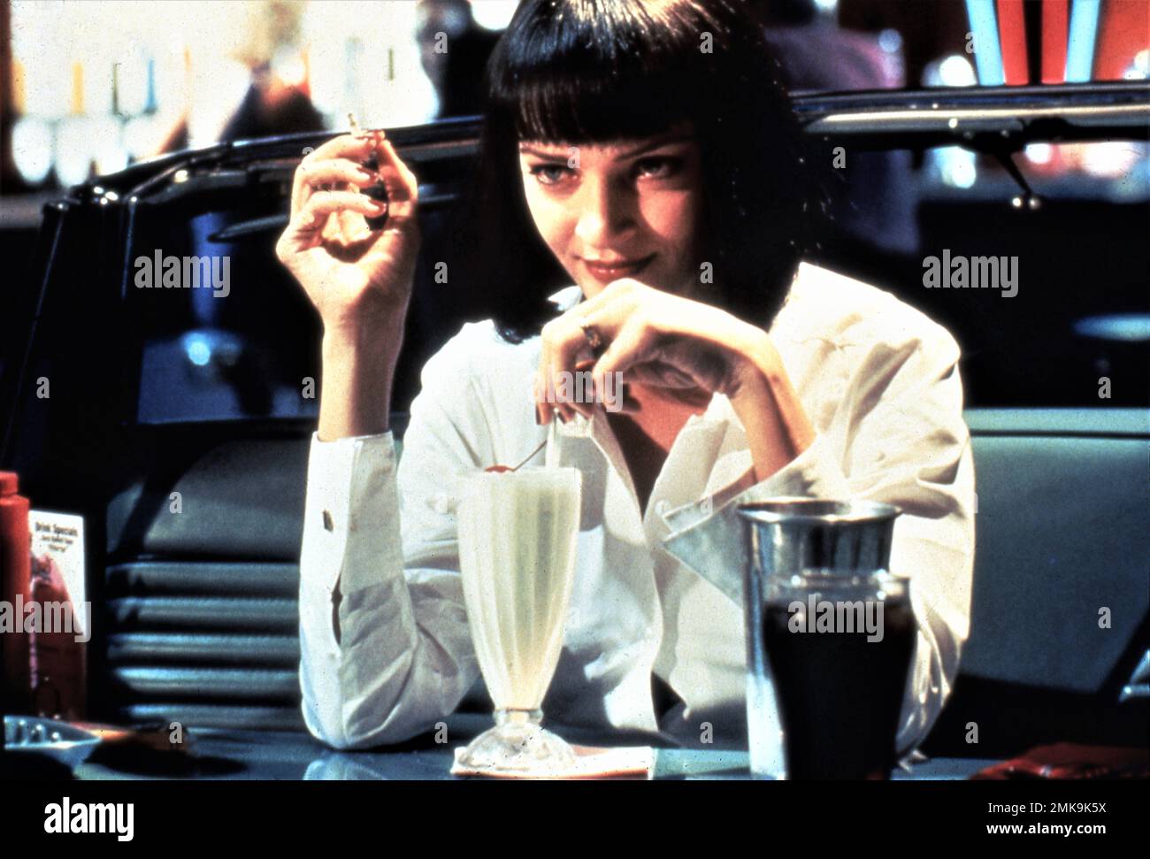 UMA THURMAN in PULP FICTION 1994 director / writer QUENTIN TARANTINO stories Quentin Tarantino and Roger Avary costume design Betsy Heimann producer Lawrence Bender A Band Apart / Jersey Pictures / Miramax (USA) - Buena Vista International (UK) Stock Photo