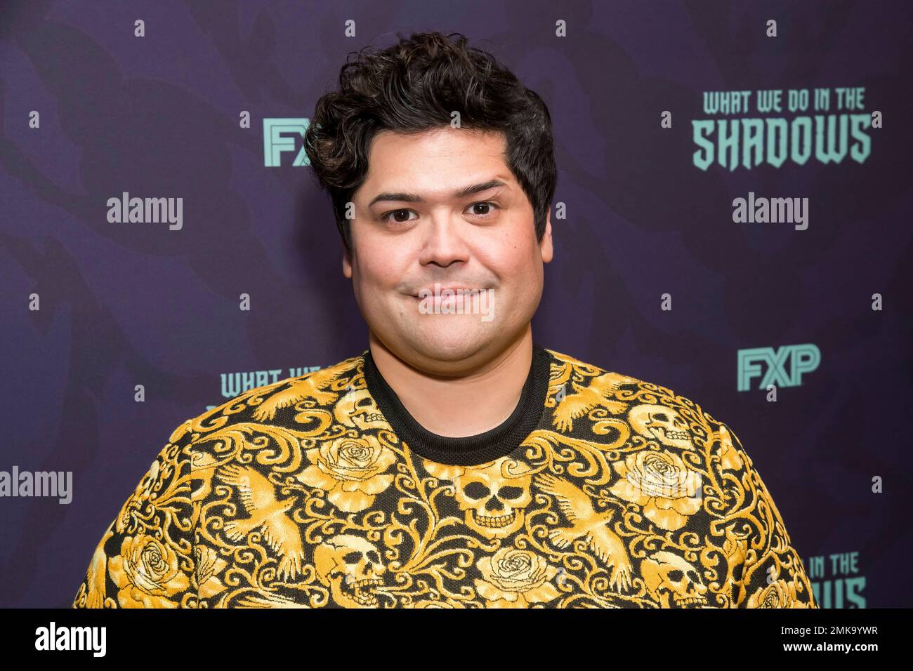 Harvey Guillen attends the premiere of FX's "What We Do in the Shadows