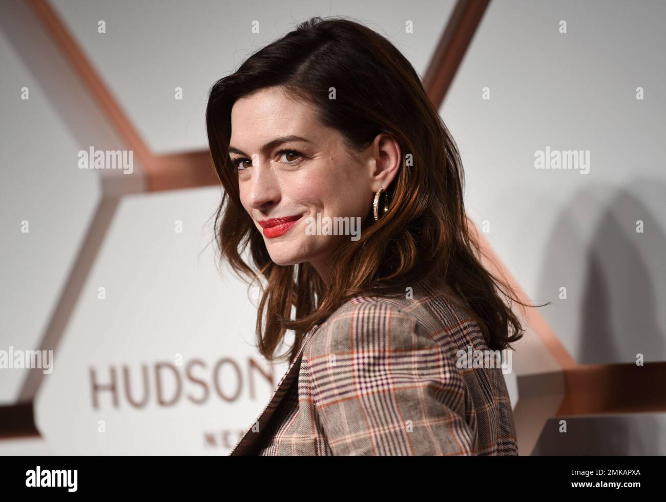 Anne Hathaway attends the grand opening of the Shops & Restaurants at