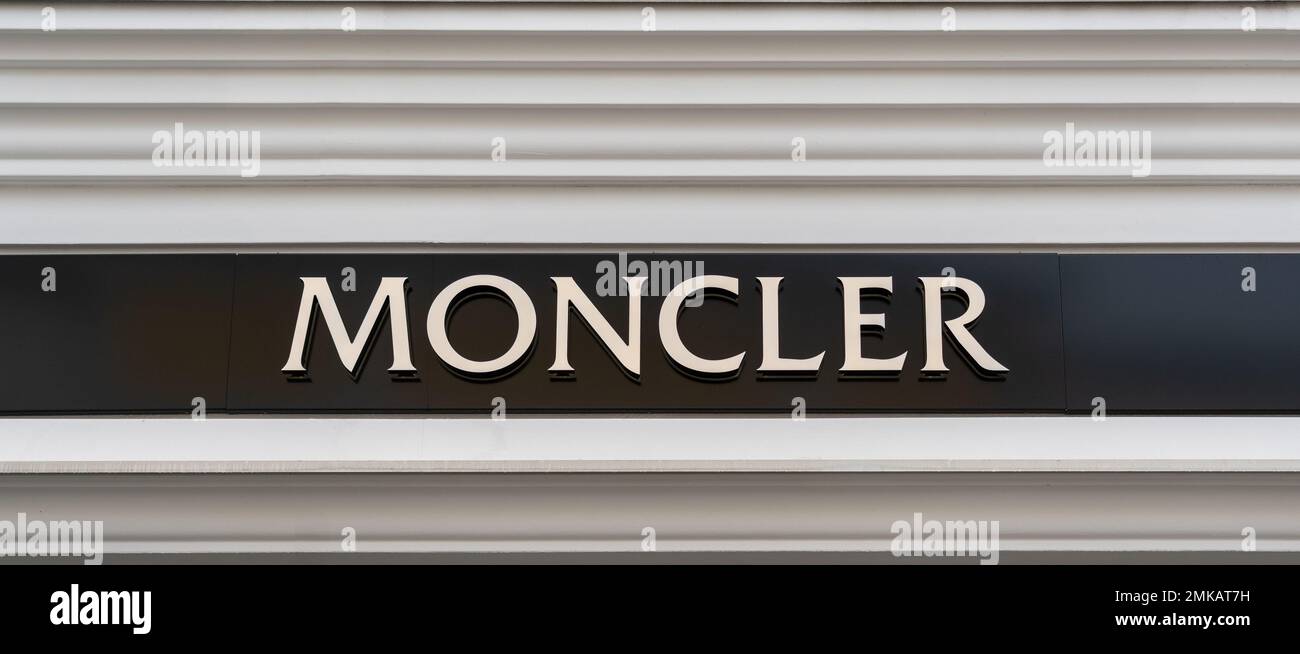 Vienna, Austria - December 10, 2022: Moncler store sign with gold ...